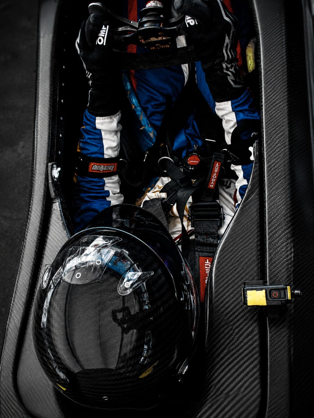 Top-down cockpit view of Filippo Massa seated in a race car