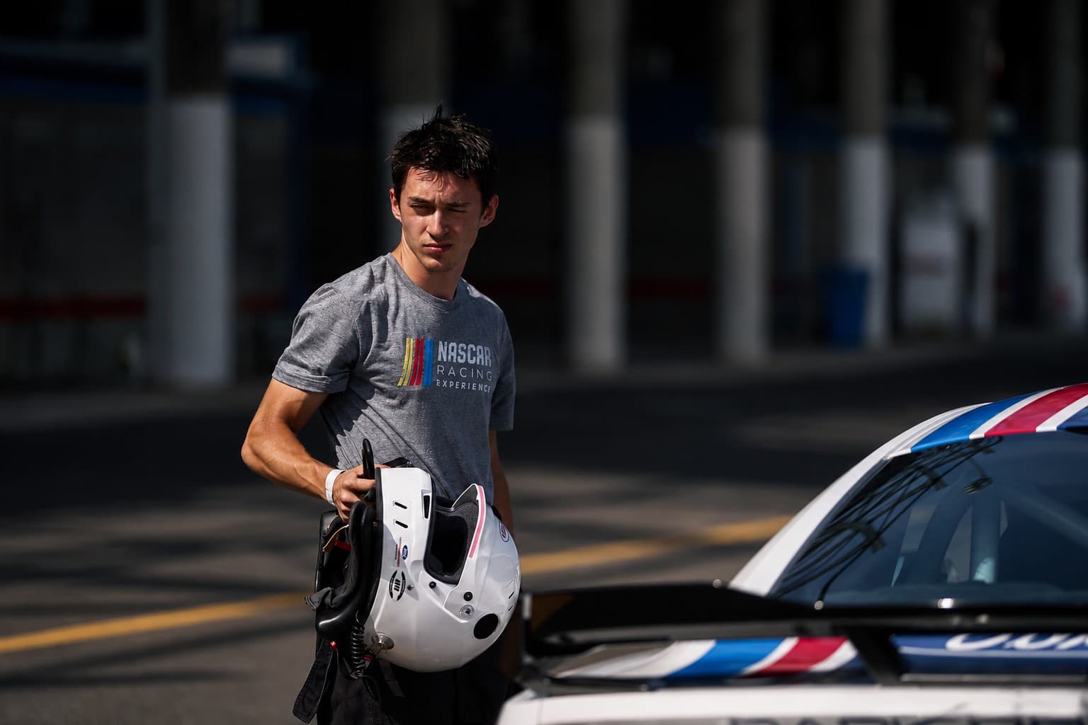 Filippo Massa helmeted over race car number 49