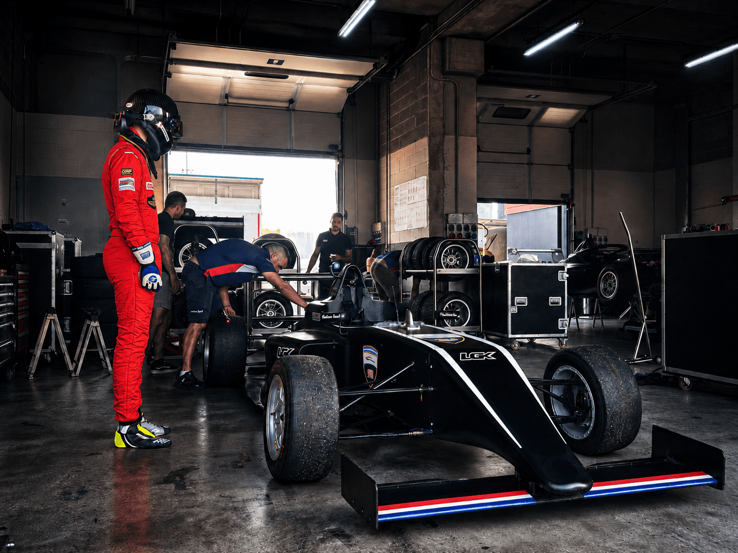 Filippo Massa seated in a red formula car cockpit