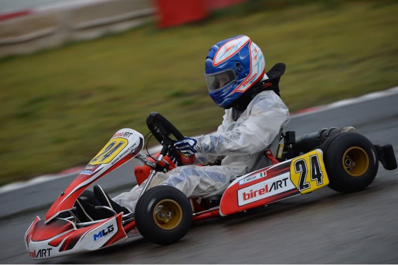 Filippo Massa racing a Birel ART kart in wet conditions