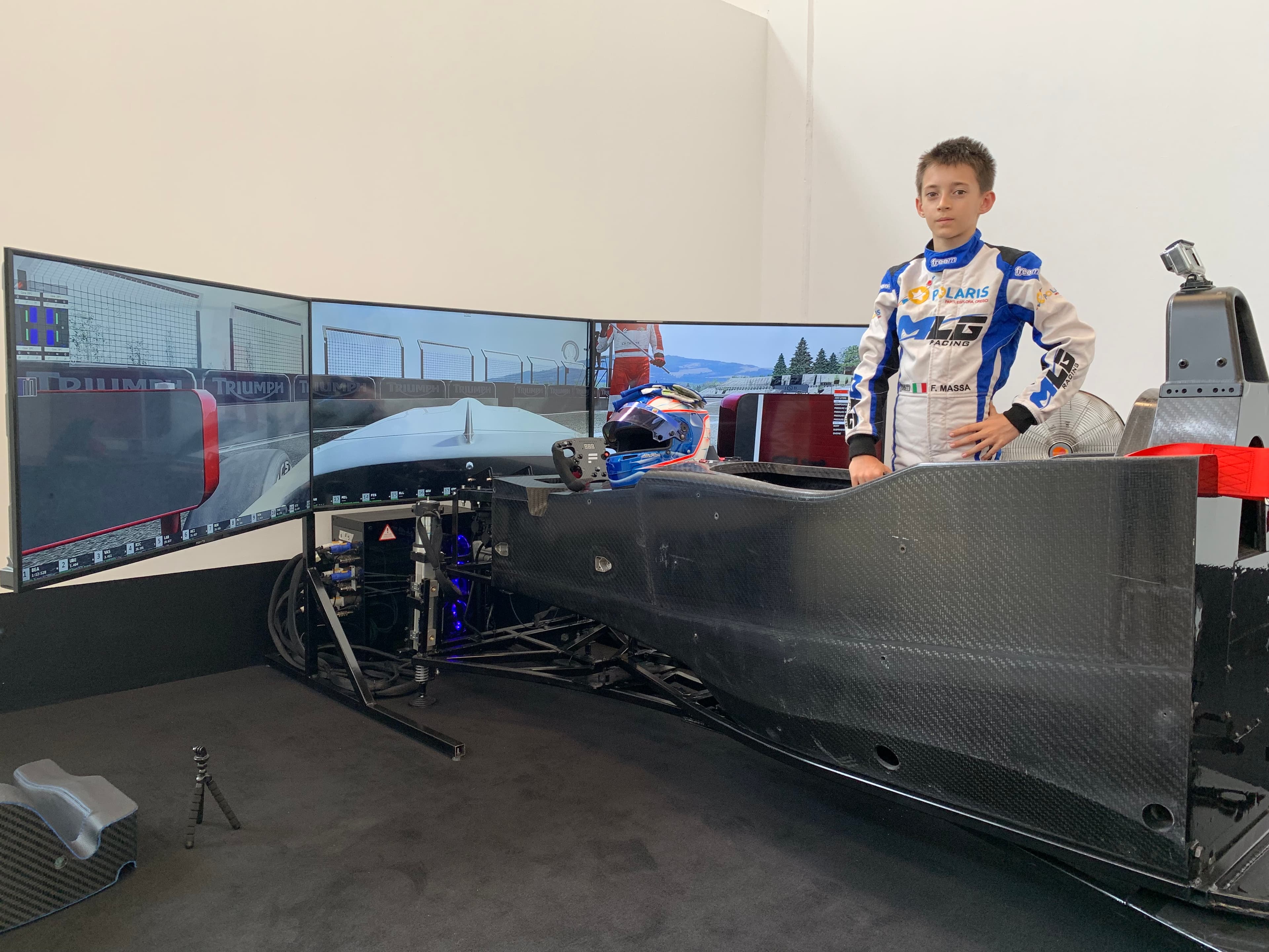 Young Filippo Massa working in a racing simulator