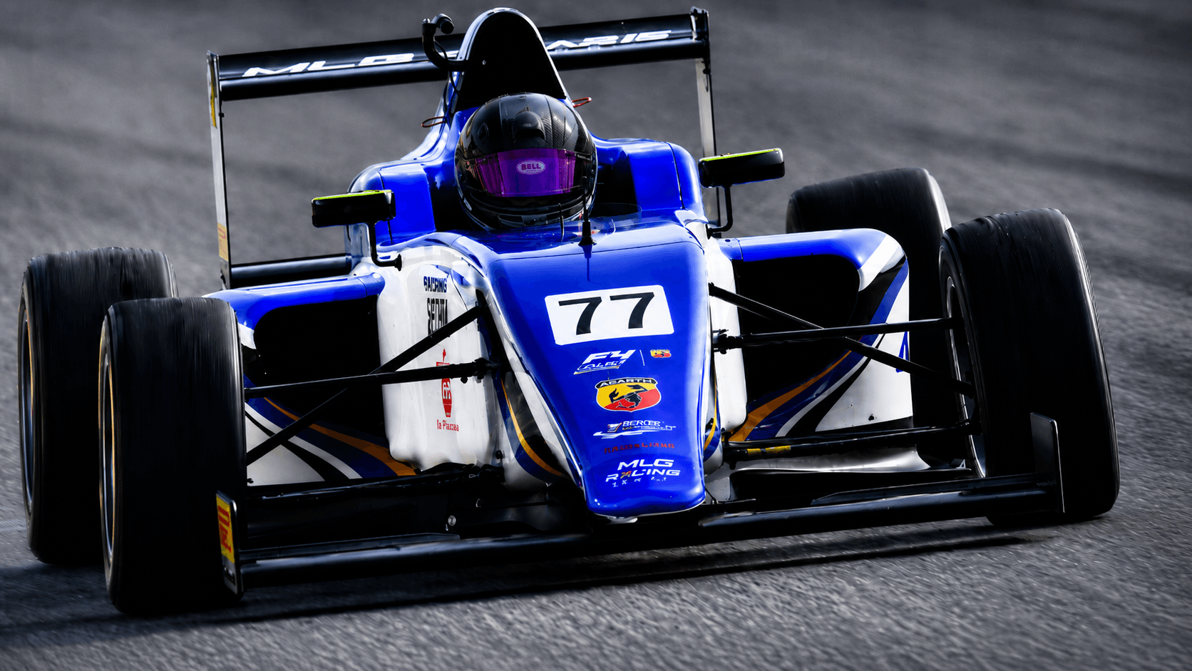 Blue Formula 4 car in front view action during development