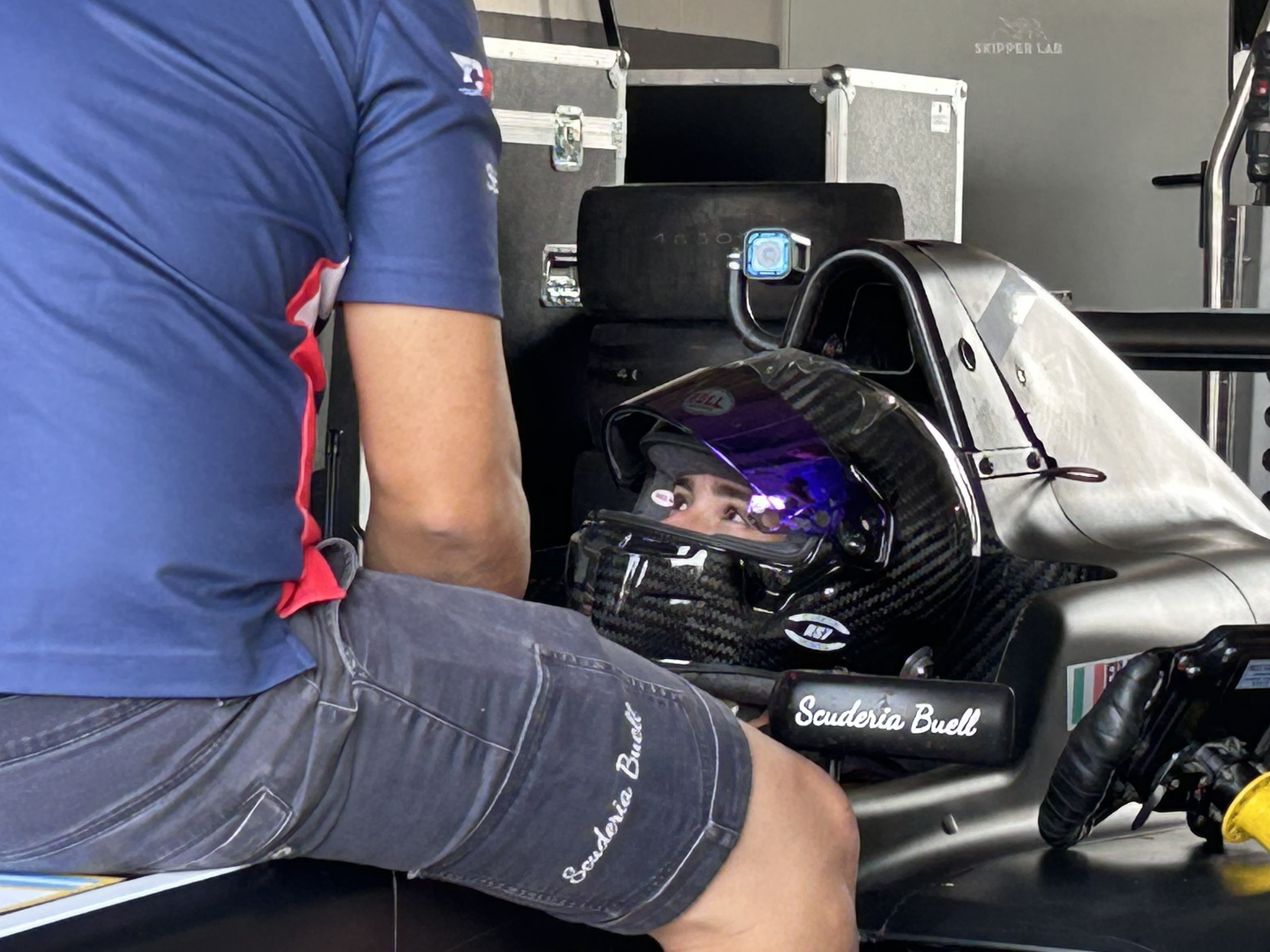 Cockpit feedback and technical review around a race car