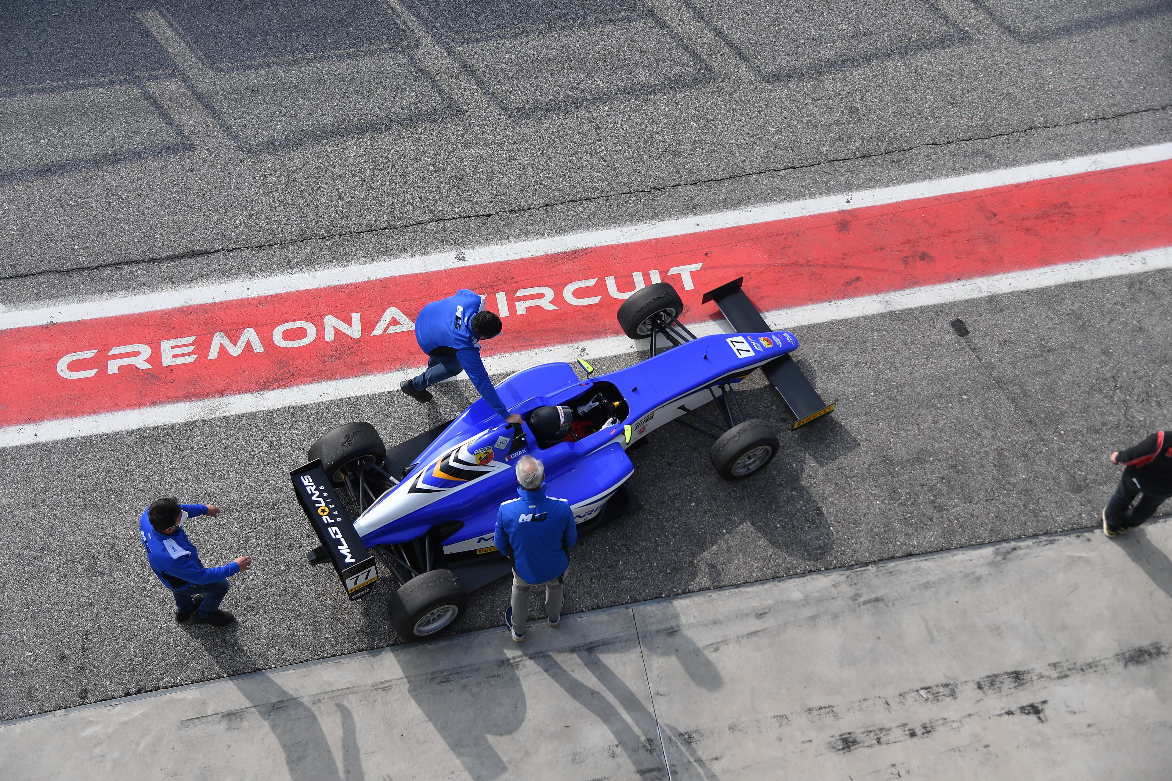 Overhead view of a formula car in a race development environment