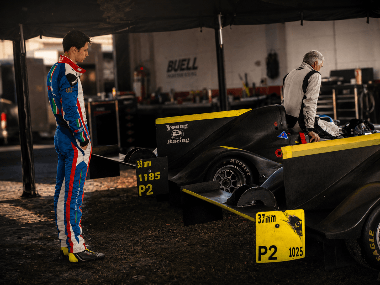 Filippo Massa trackside with a race car during coaching
