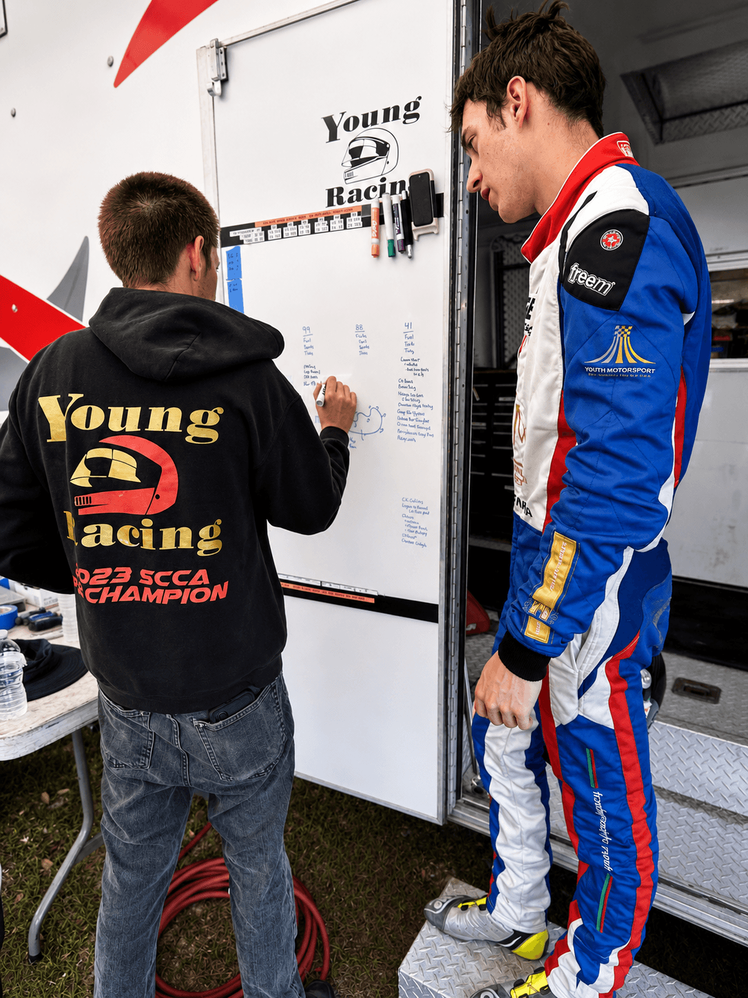 Filippo Massa during a whiteboard briefing with setup notes