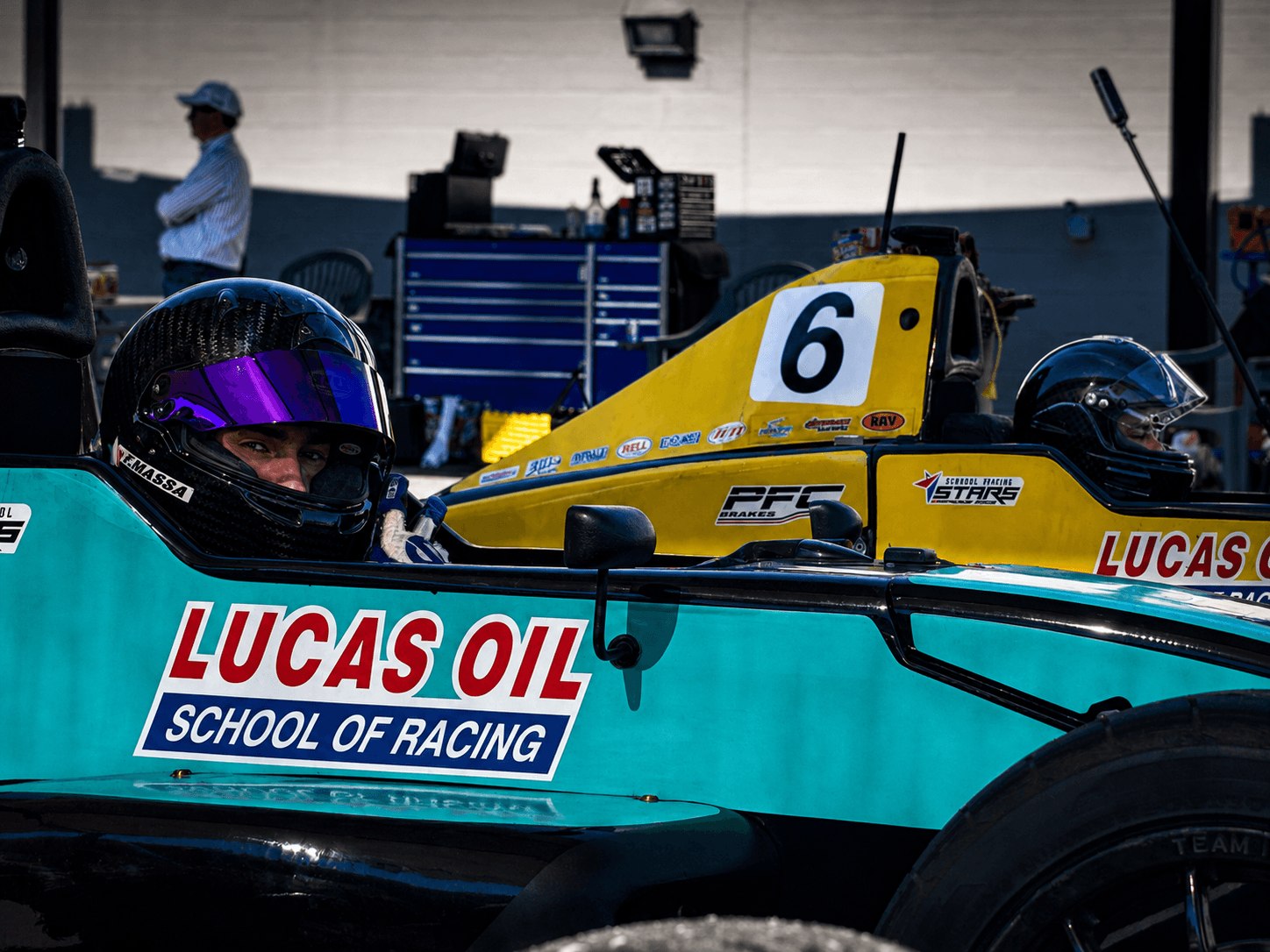 Filippo Massa helmeted on the starting grid making eye contact
