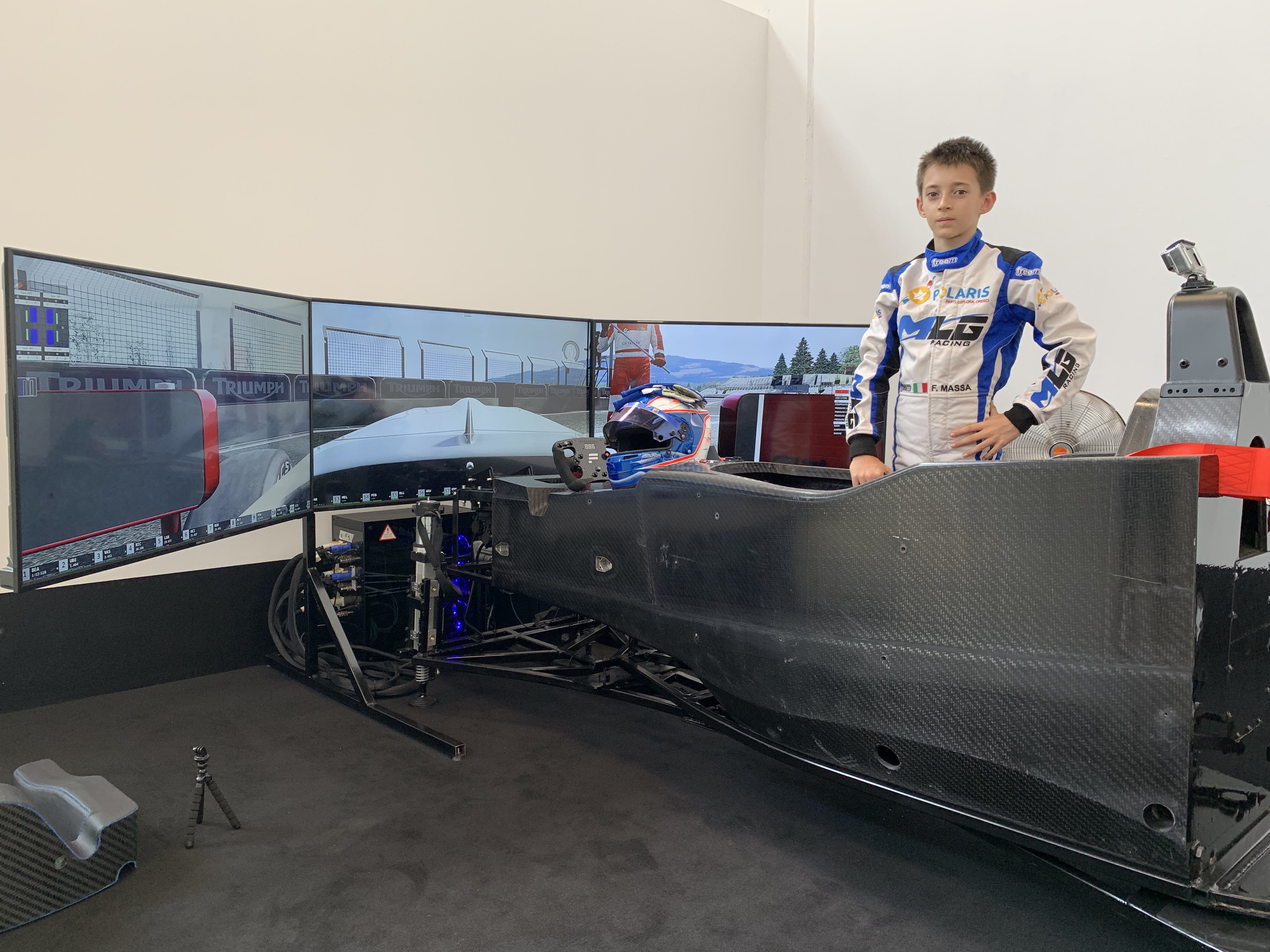 Young Filippo Massa working in a racing simulator